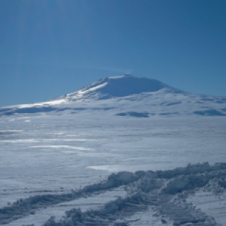 Mount Erebus, the southernmost active volcano. This is the view from LDB, where we will be working. Distance estimation is impossible here. The base of that mountain is 25 miles from LDB. I guessed a mile. I would have died if I were an Antarctic explorer in old times.
