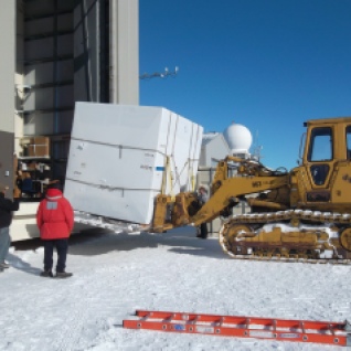 Our cryostat, Theo, is delivered to the high bay.
