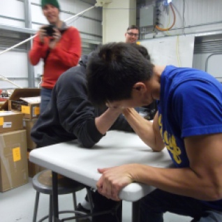 To celebrate the beginning of the nitrogen fill, Ed and Ivan had their arm wrestling match. I think I might have captured the moment when Ed's tendon got sprained. Arm wrestling is apparently a sort of dangerous game.